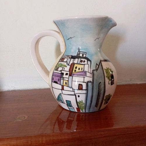 Handmade clay decorations like new, jug, vase, cup, napkin holder