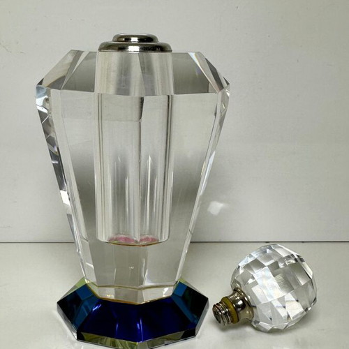 Vintage faceted crystal perfume bottle with iridescent prism base