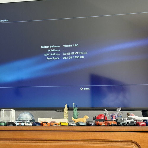 Sony PlayStation 3 Slim 320GB console used with 2 controllers and cables