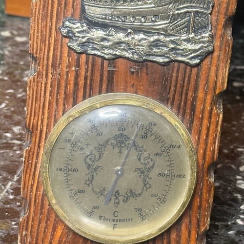 Vintage nautical wall thermometer with wooden base and sailboat