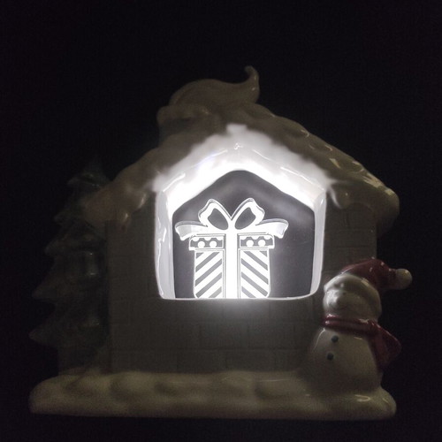 Christmas house with lighted gift, new