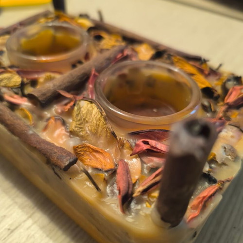 Handmade rectangular candle with aromatic potpourri like new
