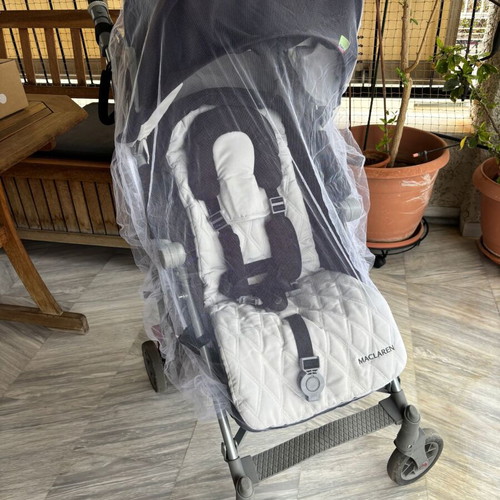 Maclaren Techno XLR stroller used with accessories and carrycot