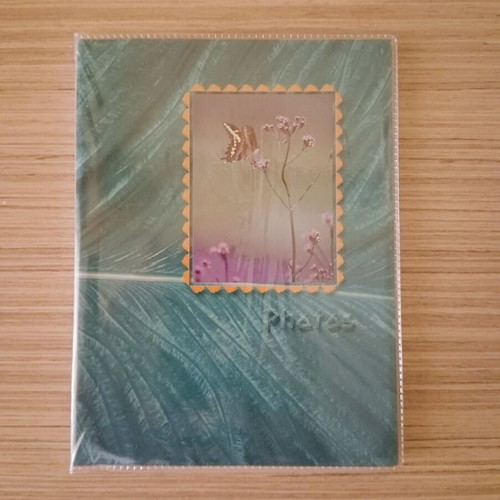 Photo album new, holds 36 photos, 12x16cm