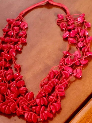 Red multi-strand stone necklace