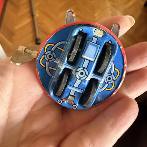 Vintage tin toy UFO with wind-up mechanism used