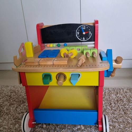 ELC Wooden Activity Workbench used with accessories
