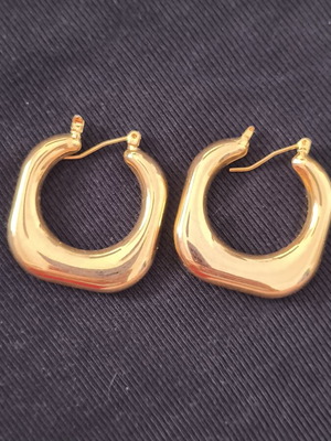 Earrings new, gold color, surgical steel, unique design