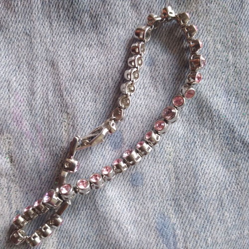 Steel bracelet with pink stones in excellent condition