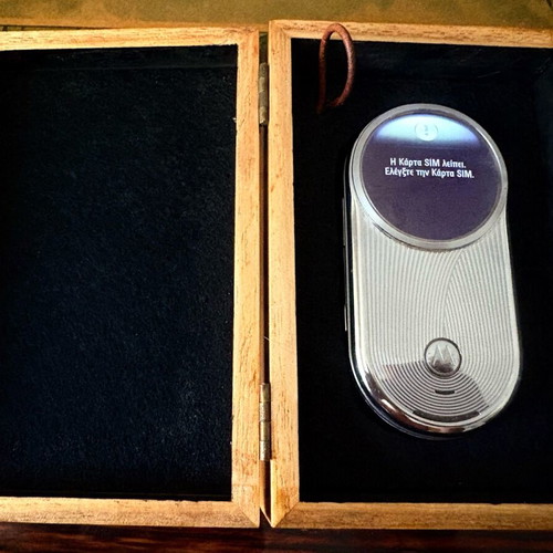 Motorola Aura used silver mobile phone