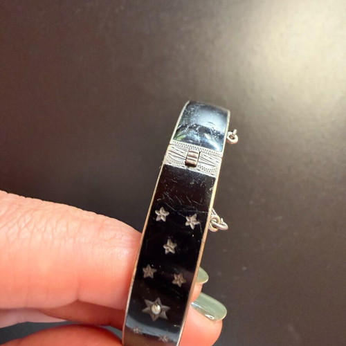 Vintage black bracelet cuff with stars used