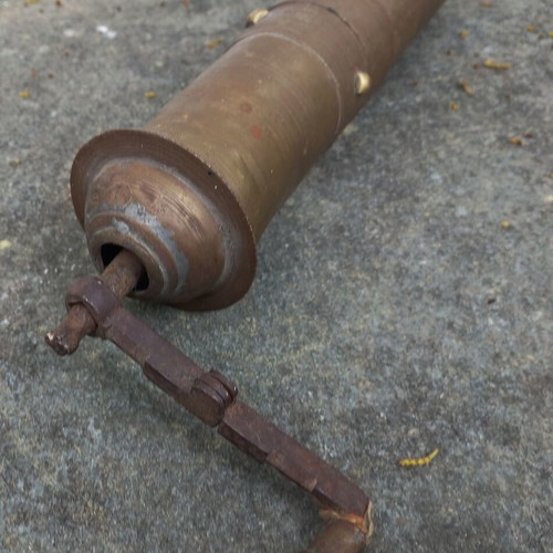 Old brass coffee-pepper grinder used