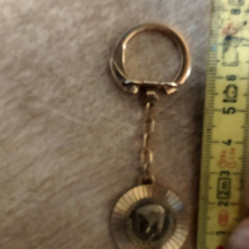Kennedy keychain used, gold color
