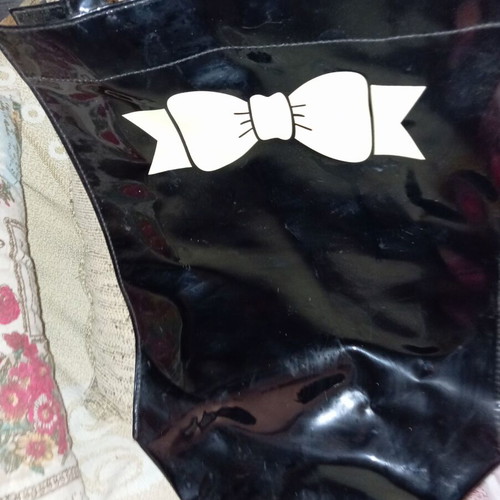Women's shoulder bag new, black glossy with ecru bow