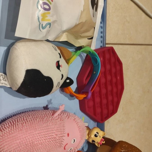 Small assorted toys used, pack of 8 pieces