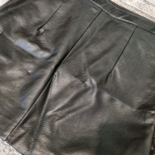 Skirts pack of 2 black, one leather type and one vinyl, used, H&M