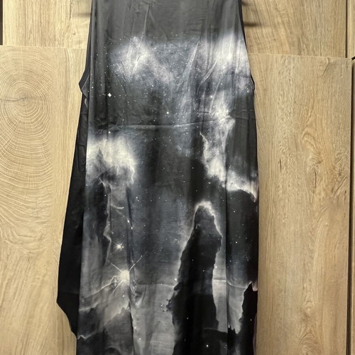 Two-piece tunic new with sheer bottom and unique effect