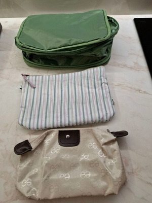 Toiletry bags new, beige and green