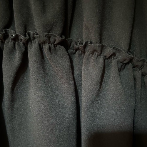 Women's blouse with ruffles black, like new, size M