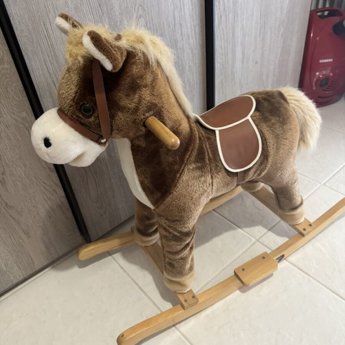 Rocking horse with sounds like new