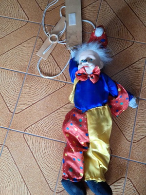 Porcelain puppet theater clown doll