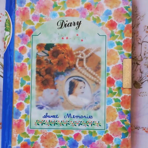 Vintage Romantic Diary like new with floral cover and metal clasp