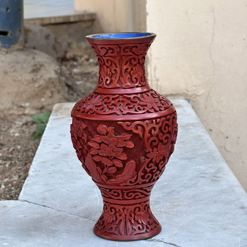 Vintage red carved vase with embossed flowers used, 19cm