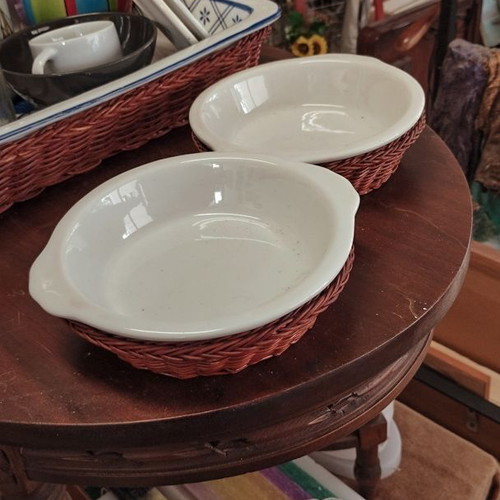 Vintage ceramic serving plates like new with wicker bases