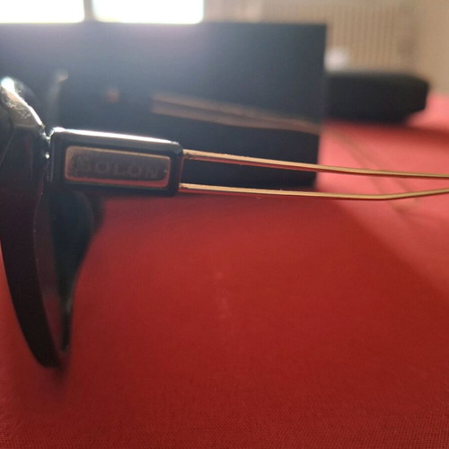 Black sunglasses with gold detail