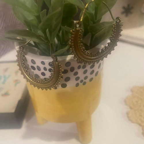 Handmade earrings used, gold-colored hoop shape