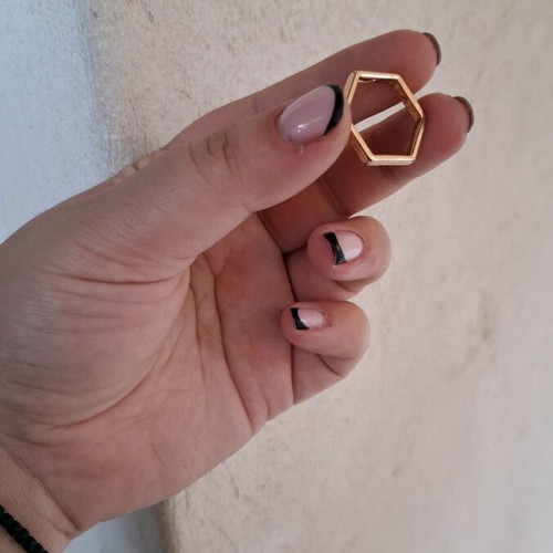 Hexagonal women's ring like new, gold color, size 19 or 20