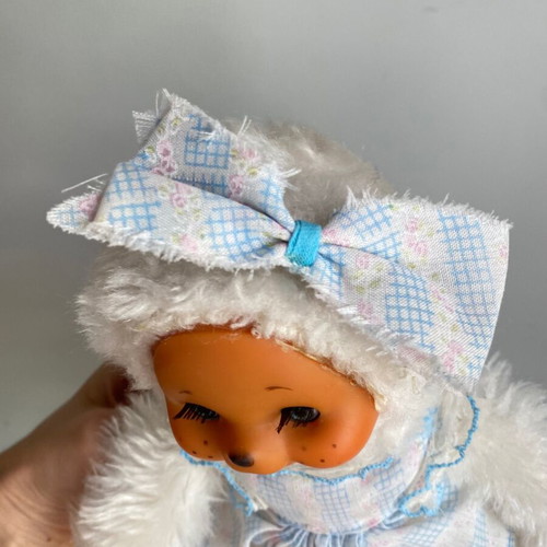 El Greco vintage white monkey plush toy in dress