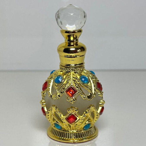 Vintage Arabic perfume bottle with gold metal frame and stones