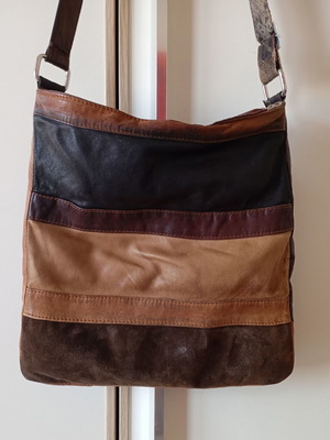Crossbody bag made of suede used with signs of wear