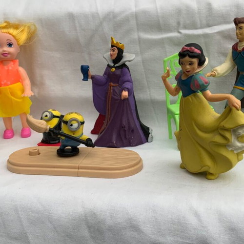Miniature toys used, old and new figures set