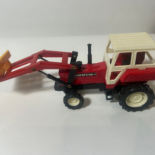 Toy tractor loader new, metal-plastic with spring mechanism