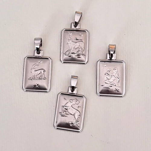 Zodiac white gold k14 pendant like new, platinum plated