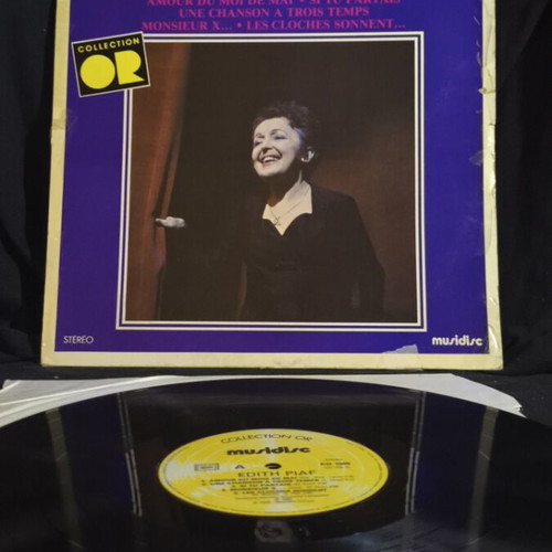 Edith Piaf vinyl record used, tape on cover
