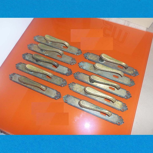 Metal door handles with antique decorative elements, set of 10 used