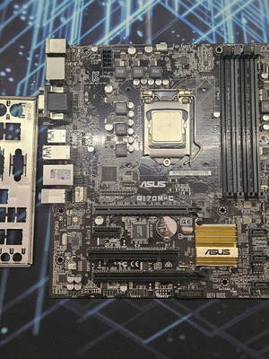 Asus D170M-C motherboard with Intel i5 6500 and backplate