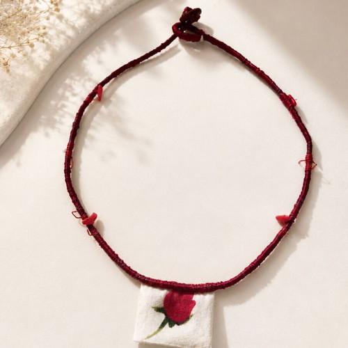 Handmade pendant with semi-precious stones rose motif used, red