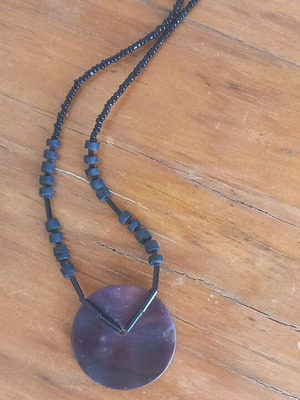Turtle shell and bead necklace