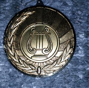 Μετάλλιο μουσικής που ανήκε στον Οδυσσέα Δημητριάδη