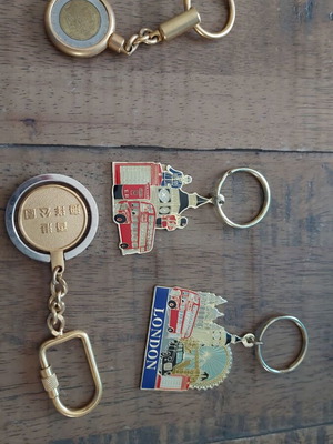 Keyrings new, 4 pieces with London, Hong Kong, San Marino souvenirs
