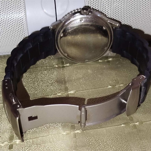 Newman watch used with blue dial and white crystals