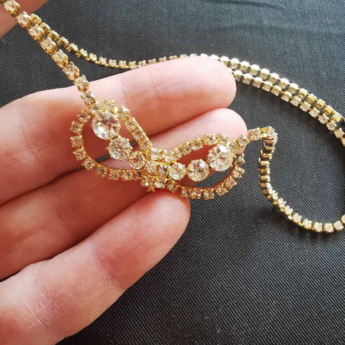 Necklace with white stones, new, yellow color