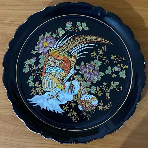 Vintage decorative plate used with chip on edge