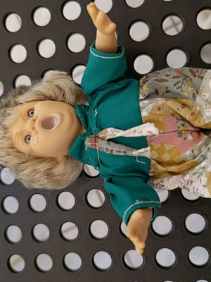 Doll used for spare parts missing one leg