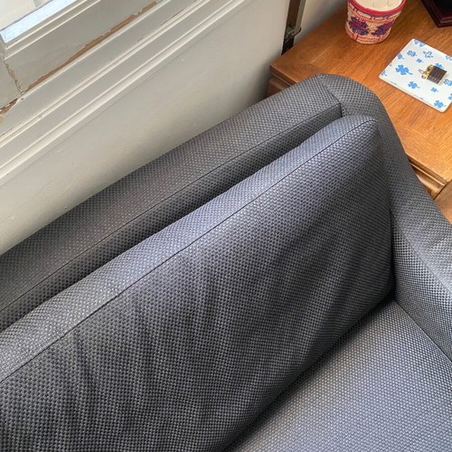 Sofa four-seater like new, black fabric, metal legs