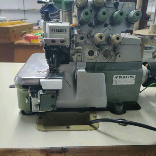 Pegasus cutting sewing machine used, good condition, three-phase power